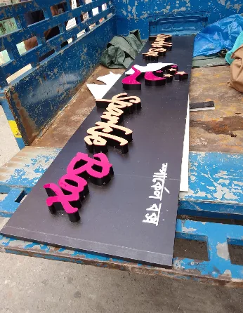Acrylic three-dimensional letter cut-outs during fabrication