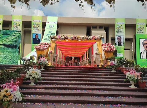 Floral decorated stage and stairway entrance for a corporate ceremony