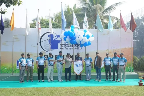 Opening line-up and flag display at the NDE Infrastructure golf tournament